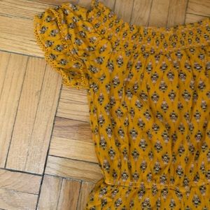 Yellow off the shoulder patterned jumpsuit